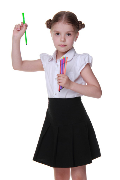 Studio portrait of schoolgirl with felt-tip pens - Фото, зображення