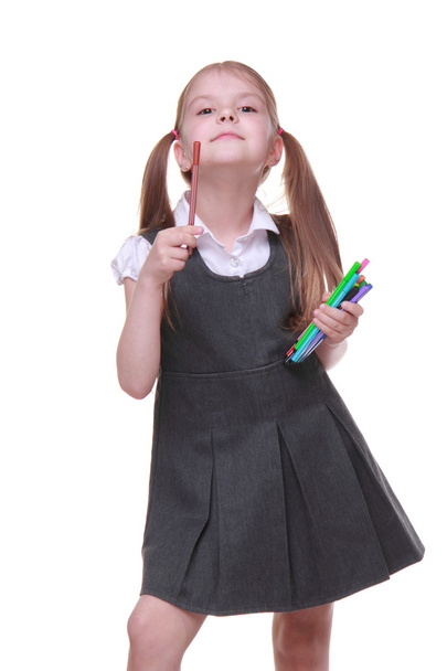 Studio portrait of schoolgirl with felt-tip pens - Fotografie, Obrázek