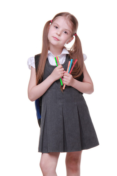 Studio portrait of schoolgirl with felt-tip pens - Fotoğraf, Görsel