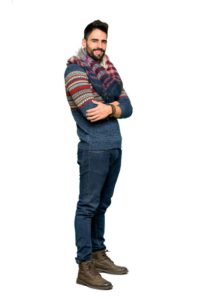Full-length shot of Hippie man with arms crossed and looking forward on isolated white background - Foto, Imagen