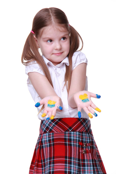 Happy little girl with hands painted as ukrainian flag - Fotografie, Obrázek