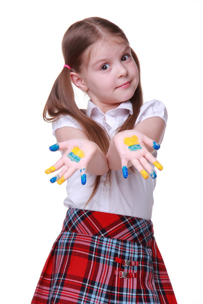 Happy little girl with hands painted as ukrainian flag - Фото, зображення