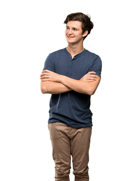 Teenager man Happy and smiling over isolated white background - Φωτογραφία, εικόνα