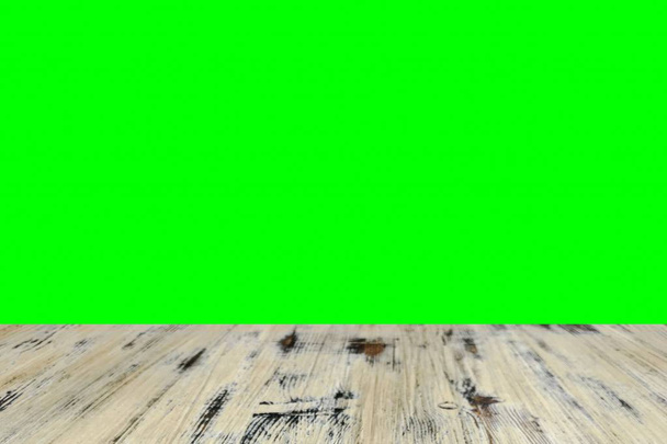 régi festett mosott Tölgy fa asztal a homályos chroma key zöld képernyőn jeleníti meg a háttérben. zöld képernyő stock footage videóinak - Fotó, kép