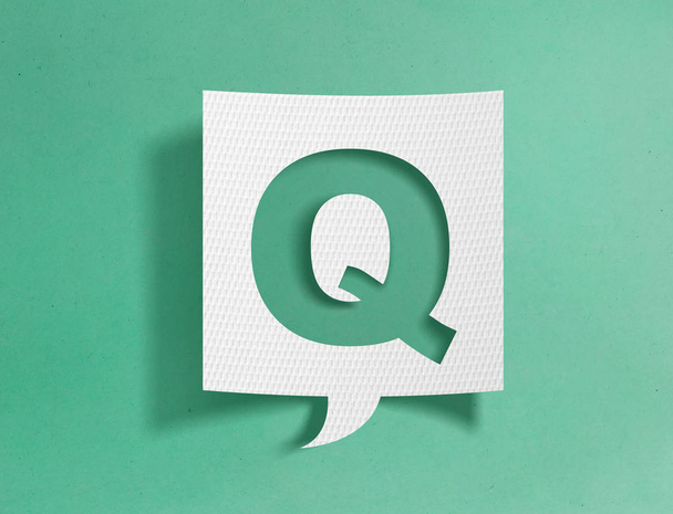 Dymek z literą Q na zielonym tle - Zdjęcie, obraz