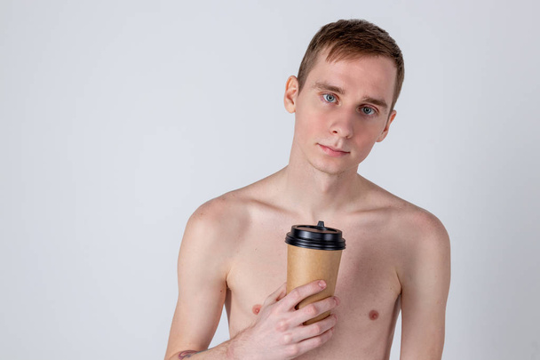 Guy drink from coffee or tea cup - Foto, imagen