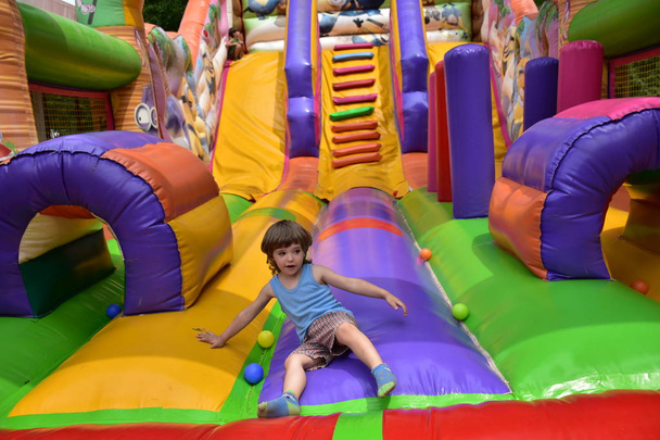 child play on the inflatable castle - Photo, Image