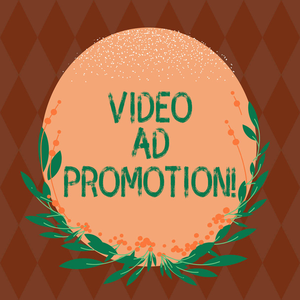 Writing note showing Video Ad Promotion. Business photo showcasing help drive more views and subscribers to your channel Blank Color Oval Shape with Leaves and Buds as Border for Invitation. - Photo, Image
