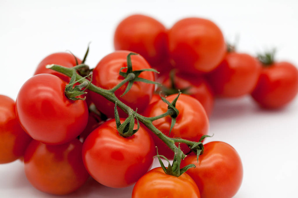 cherry tomatoes on a white background - Фото, зображення