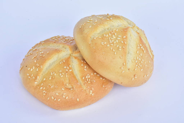 buns with sesame seeds on white background - Photo, Image