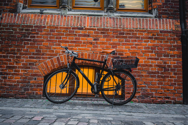 Bremen, Germany, January, 2019 - Bicycle parking on an empty street in Bremen - Φωτογραφία, εικόνα