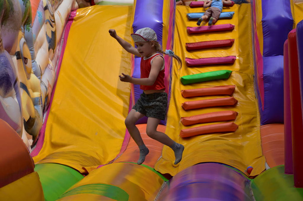 children play on the inflatable castle, - Photo, Image