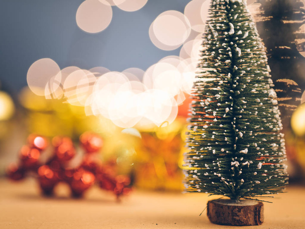 christmas tree,isolated on wooden board,studio shot. - Фото, изображение