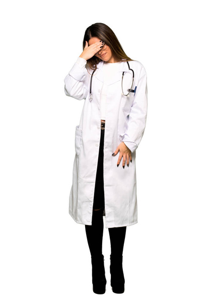 Full body of Young doctor woman with tired expression - Photo, Image