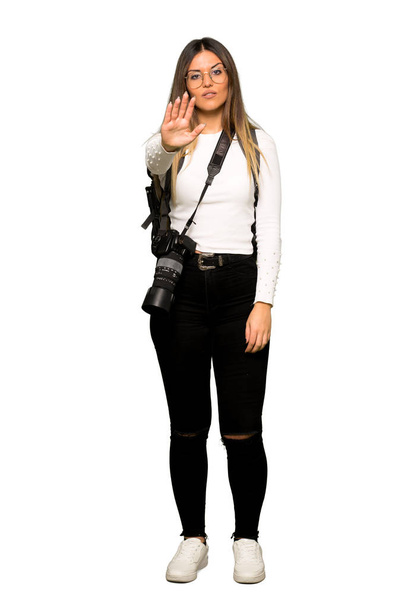 Full body of Young photographer woman making stop gesture denying a situation that thinks wrong - Фото, изображение