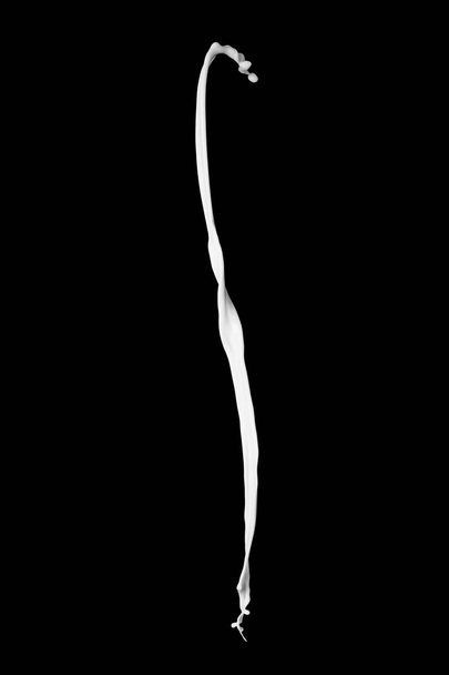 splash of milk on a black background - Foto, Imagem