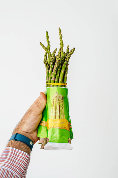 bunch of fresh green asparagus - Фото, изображение