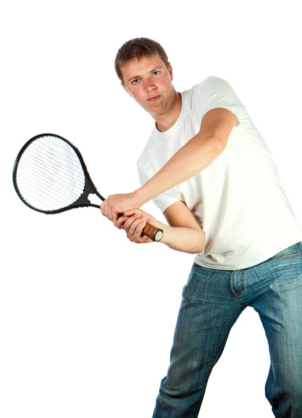 νεαρός άνδρας με τη ρακέτα του τένις - Φωτογραφία, εικόνα