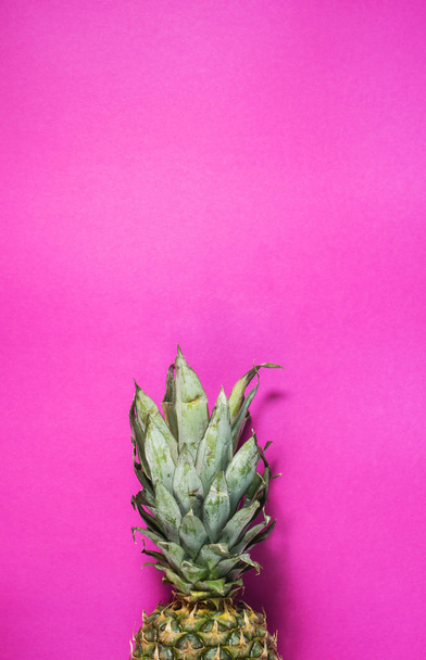 Pineapple on pink background. Summer concept. Flat lay, top view - Foto, imagen