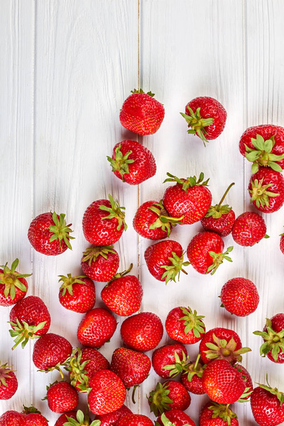 Arrangement of fresh strawberries on white background. - Foto, immagini