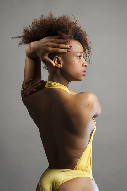 colored woman with bikini posing studio session - Zdjęcie, obraz