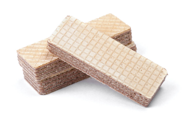 Четыре прямоугольной формы вафельные печенья изолированы на белом фоне
 - Фото, изображение