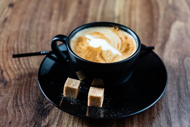 cup of cappuccino with brown sugar - Φωτογραφία, εικόνα