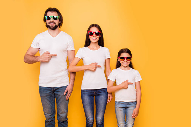 Portrait of nice-looking attractive charming trendy cheerful people wearing colorful modern eyewear hierarchy order pointing aside isolated over shine vivid pastel yellow background - Fotografie, Obrázek