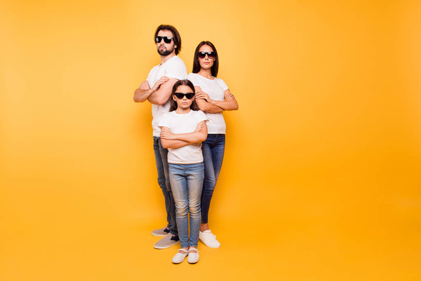 Full length body size view portrait of nice-looking content attractive minded serious people company team wearing dark glasses isolated over shine vivid pastel yellow background - Photo, Image