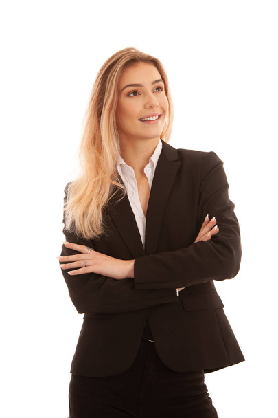 Beautiful blond young business woman in black suit isolated over white - Foto, Imagem