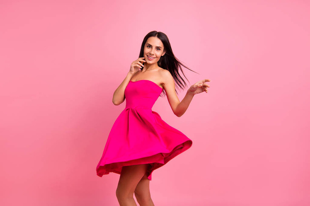 Close up photo cute she her lady spring romance mood spinning whirling hair dress flight round blow smiling wearing bright classy chic vivid pink formal-wear outfit isolated on rose background - Zdjęcie, obraz