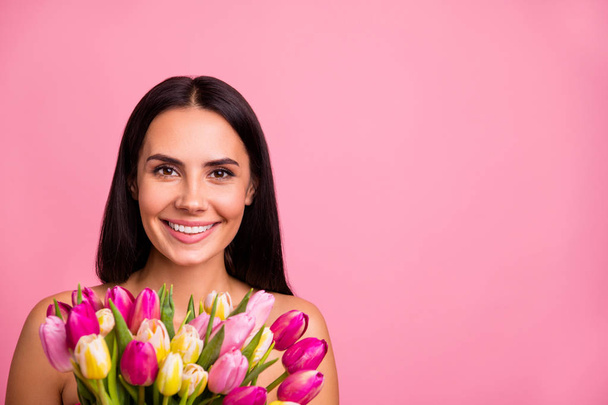 Close-up portrait of her she nice cute attractive lovely winsome charming cheerful brunette lady colorful flowers florist ad advert advertising shop isolated on pink pastel background - Zdjęcie, obraz