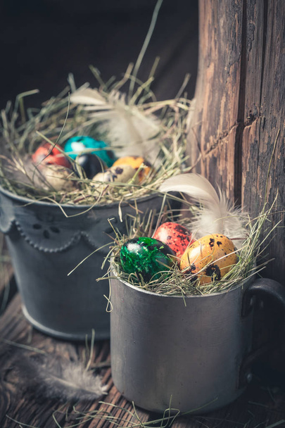 Closeup of Easter eggs in old metal cup - Foto, Imagen