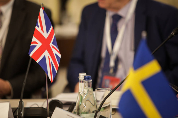 Détails avec le drapeau du Royaume-Uni lors d'une conférence de fonctionnaires de l'Union européenne
 - Photo, image