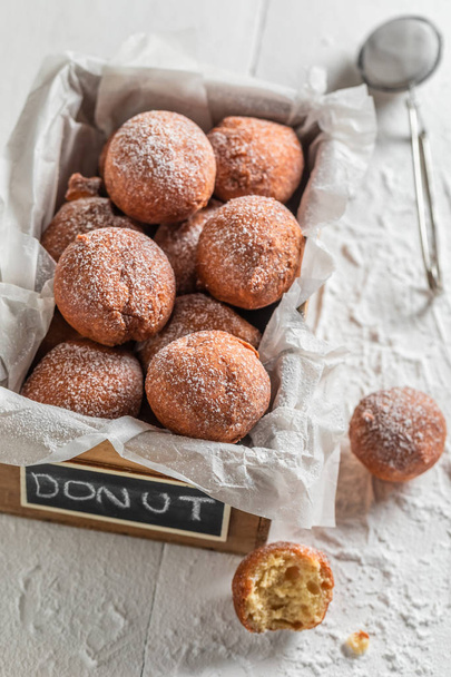 Sweet and fresh mini doughnuts hot and freshly baked - Foto, imagen