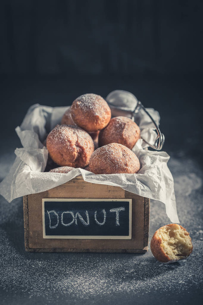 Delicious and sweet mini doughnuts with powdered sugar - 写真・画像