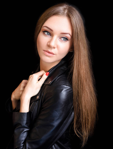 Portrait of a beautiful young woman with long hair - Zdjęcie, obraz