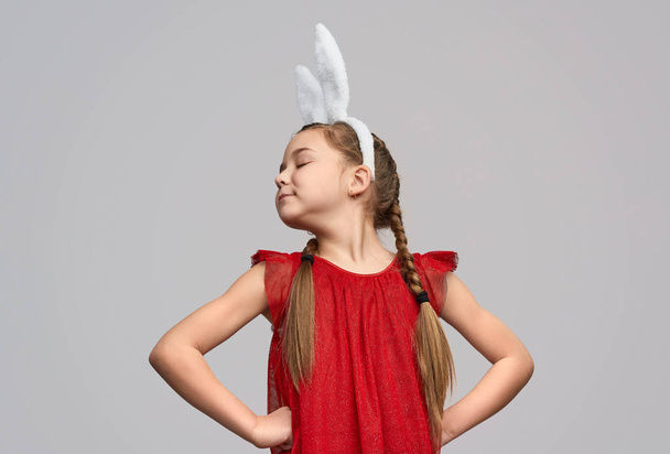 Cute proud girl in white bunny ears  - Valokuva, kuva