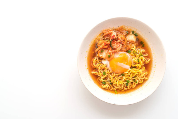 Korean instant noodles with kimchi and egg isolated on white background - Photo, image