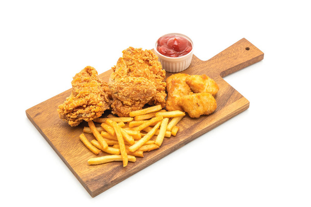 fried chicken with french fries and nuggets meal (junk food and unhealthy food) isolated on white background - 写真・画像
