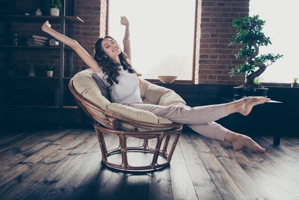 Close up photo amazing beautiful brunette she her lady homey living room long waited vacation having fun eyes closed morning wearing domestic home apparel clothes outfit sit comfy arm-chair - Photo, Image