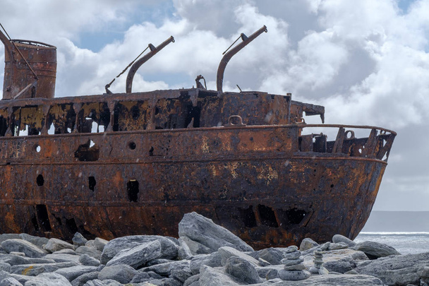 Rusty shipwreck on shore of Aran islands, Galway bay, Ireland - Photo, Image