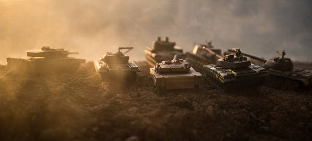 War Concept. Military silhouettes fighting scene on war fog sky background, World War Soldiers Silhouettes Below Cloudy Skyline at sunset. Attack scene. Armored vehicles. tank in action - Foto, Bild