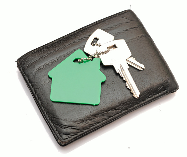 dům ve tvaru řetězce klíčů na kožené peněženky - Fotografie, Obrázek