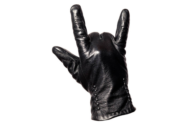 Úzká černá kožená rukavice, prsty s nápisem "kámen". Izolované na bílém pozadí. Pojmové symboly, značky, čísla - Fotografie, Obrázek