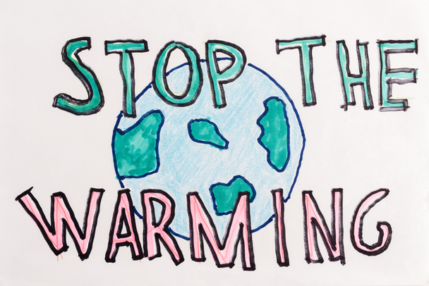 globe sign and handwritten lettering "stop the warming" on white background - 写真・画像