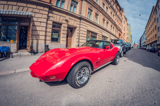 Helsinki, Finland - May 16, 2016: Old car red Chevrolet Corvette. distortion perspective fisheye lens view - Fotoğraf, Görsel