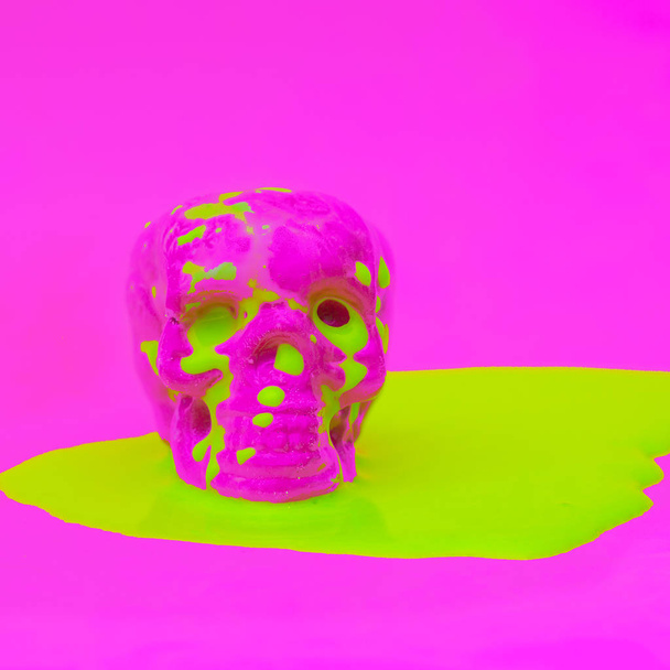 Skull in acid paint. Minimal design fashion art - Photo, Image