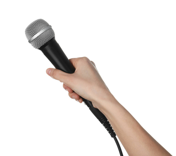 Woman holding dynamic microphone on white background, closeup - Fotografie, Obrázek