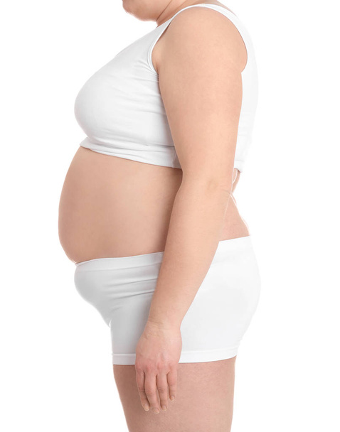 Nadwagę kobieta na białym tle, zbliżenie. Utrata masy ciała - Zdjęcie, obraz